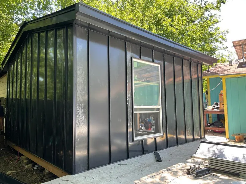 Black standing seam metal wall panels for Roof Inspection in Encinitas