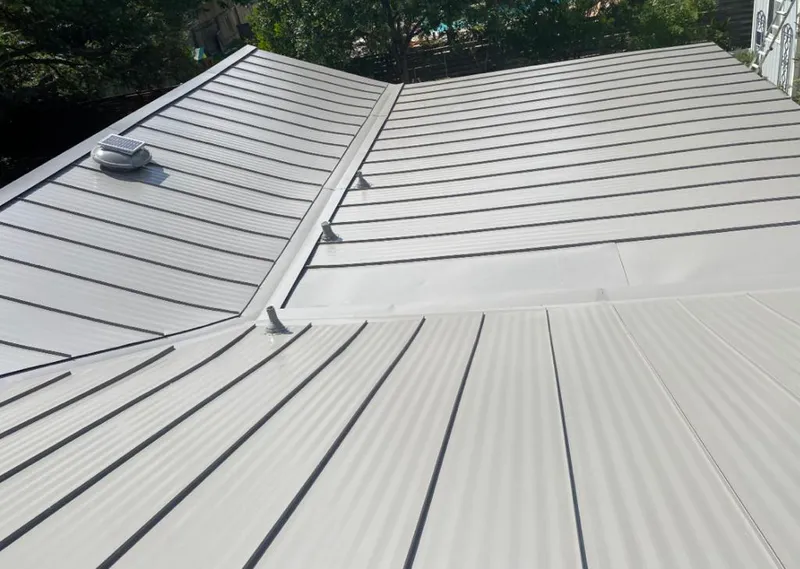 Solar attic fan installed on a metal roof for Roof Ventilation in Encinitas